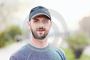 Portrait of young atractive man enjoying his day outside