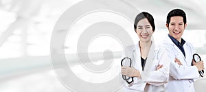 Portrait of young attractive asian doctor team or physician group crossed arm holding stethoscope medical equipment