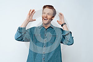 Portrait of Young Attractive Bearded Guy Laughing