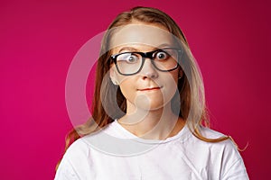 Portrait of a young attractive caucasian woman in glasses