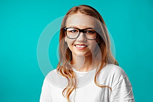Portrait of a young attractive caucasian woman in glasses