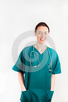 Portrait of young attractive doctor, surgeon, nurse with stethoscope