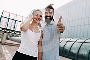 Portrait of young attractive happy fitness couple