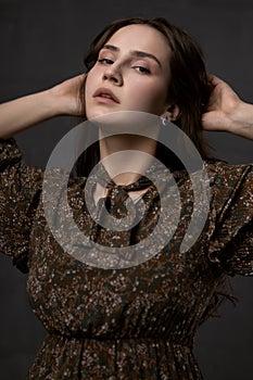 portrait of a young attractive woman with gorgeous curly hair