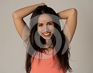 Portrait of young attractive woman with smiling face and beautiful black long hair. Beauty care