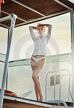 Portrait of a young attractive woman in tropics