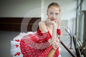 Portrait of a young ballerina with a beautiful smile. The model