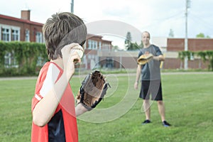 Portrait of a young baseball player in a field