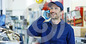 Portrait of a young beautiful car mechanic in a car workshop, in the background of a car service Concept repair of machines, fault