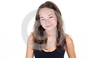 Portrait of young beautiful caucasian teen girl in black shirt smiling looking camera isolated on white background
