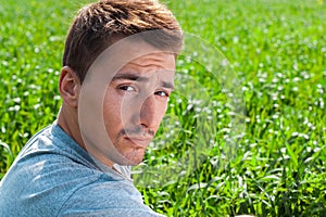 Portrait of young beautiful courageous man photo