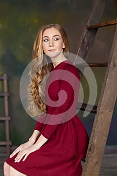 Portrait of young beautiful girl. Fashion photo. Studio