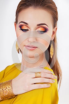 Portrait of young beautiful girl with make up