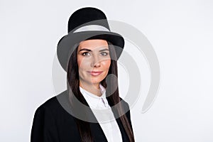 Portrait of young beautiful good mood smiling woman magician wear cylinder isolated on white color background