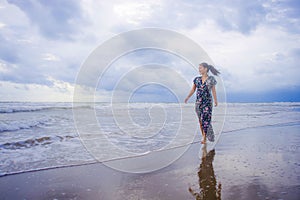 Portrait of young beautiful and happy Asian Chinese woman on her