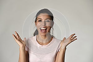 Portrait of young beautiful and happy Latin woman with big toothy smile excited and cheerful