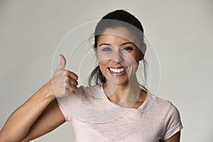 Portrait of young beautiful and happy Latin woman with big toothy smile excited and cheerful