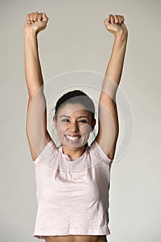 Portrait of young beautiful and happy Latin woman with big toothy smile excited and cheerful