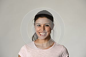 Portrait of young beautiful and happy Latin woman with big toothy smile excited and cheerful