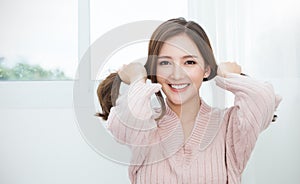 Portrait of young beautiful innocence asian woman relax in bedroom.