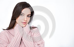 Portrait of young beautiful innocence caucasian woman over white background.