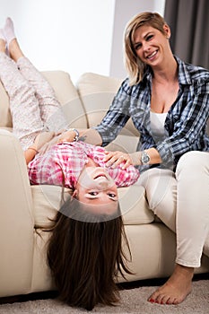 Portrait of young beautiful mother with her teenage daughter
