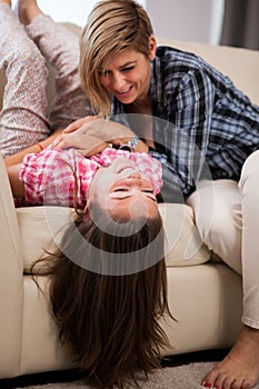 Portrait of young beautiful mother with her teenage daughter