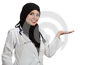 Portrait of young beautiful muslim female doctor celebrating success