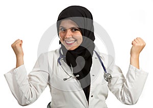 Portrait of young beautiful muslim female doctor celebrating success