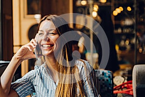 Portrait of young beautiful smiling brunette woman