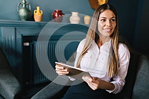 Portrait of young beautiful smiling brunette woman