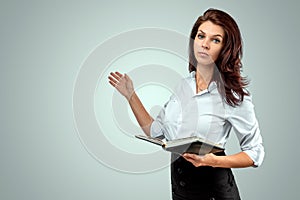 Portrait of a young beautiful teacher on a light background. Teacher`s Day Knowledge Day back to school study online learning