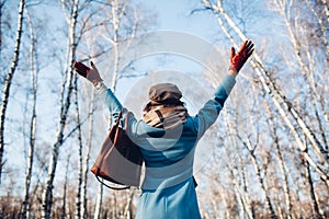 Portrait of young beautiful woman in blye autumn coat. Fashion photo