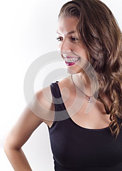 Portrait of young beautiful woman with braces