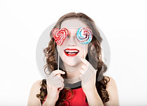 Portrait of young beautiful woman with dental braces and sugarplum glasses