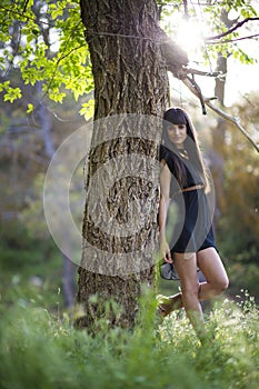 Portrait of young beautiful woman on field