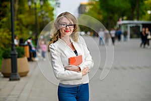 Portrait of young beautiful woman with glasses