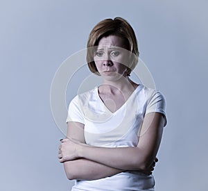 Portrait young beautiful woman on her 30s sad and depressed in breakdown suffering depression photo