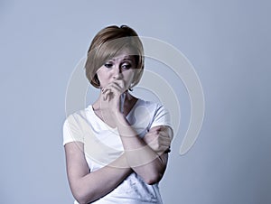 Portrait young beautiful woman on her 30s sad and depressed in breakdown suffering depression photo