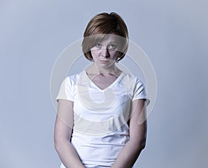 Portrait young beautiful woman on her 30s sad and depressed in breakdown suffering depression photo