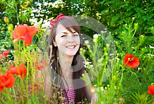 Portrait of a young beautiful woman in nature