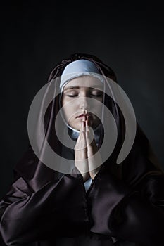 Portrait of young beautiful woman nun