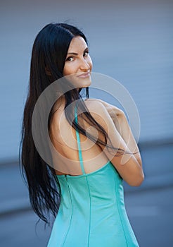 Portrait of the young beautiful woman outdoors