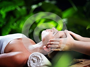 Portrait of young beautiful woman in spa