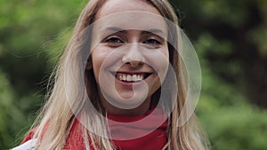 Portrait of Young Beautiful Woman Wearing Red Scarf Inhaling and Exhaling Fresh Air, Taking Deep Breath, Reducing Stress