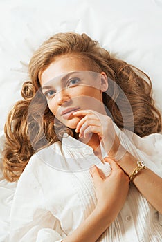 Portrait of young beautifulwoman waking up in the morning on the