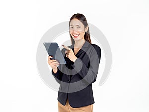 Portrait of young beauty Asian Businesswoman in black suit holding and using tablet