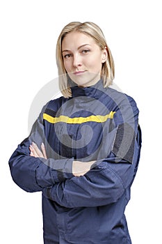 Portrait of young beauty firewoman looking to the camera with folded arms