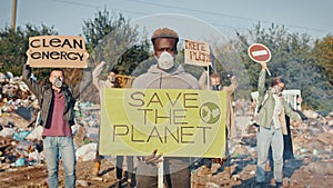 Portrait of a Young Black Man Activist With a Poster Calling to Take Care of the Environment.