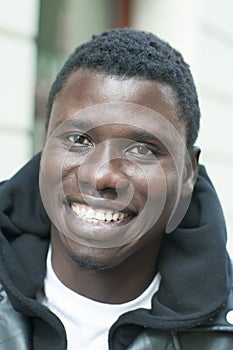 Portrait of a young black man smiling